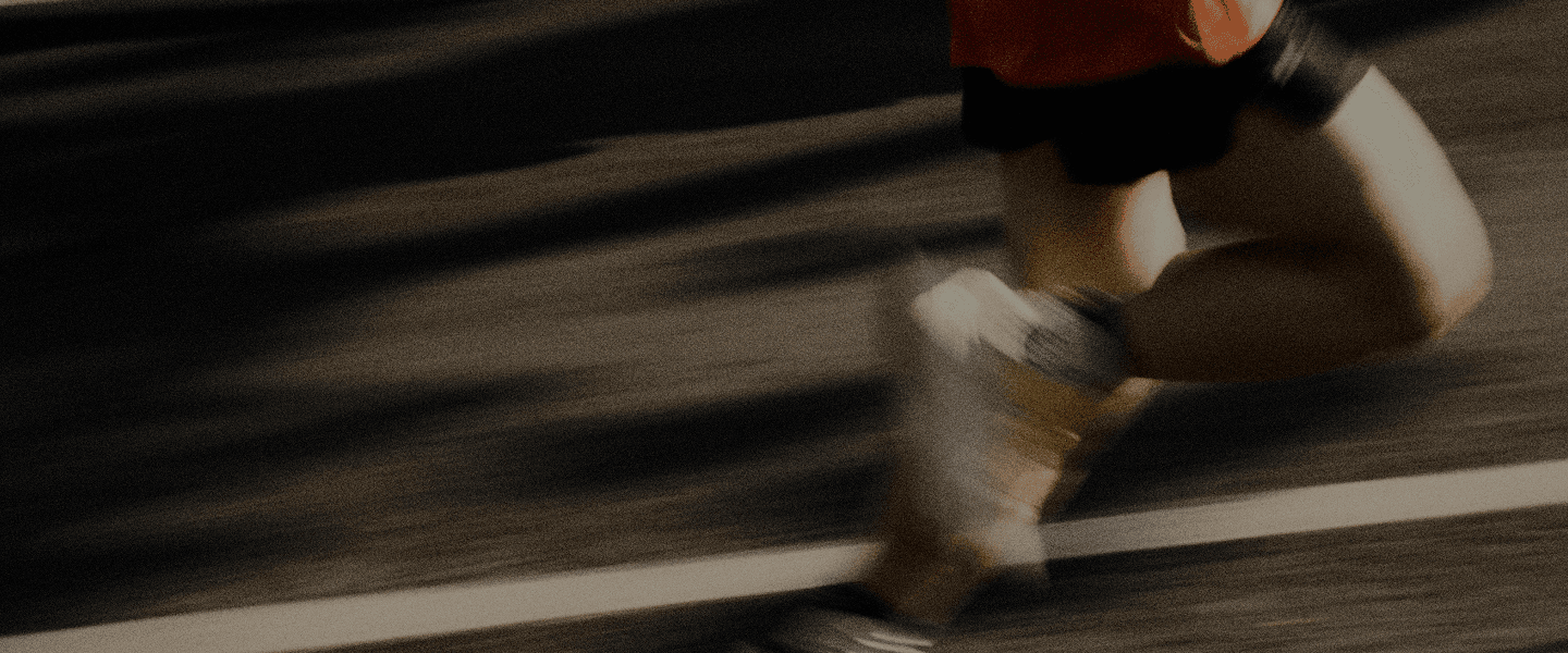 Runner in motion on a track